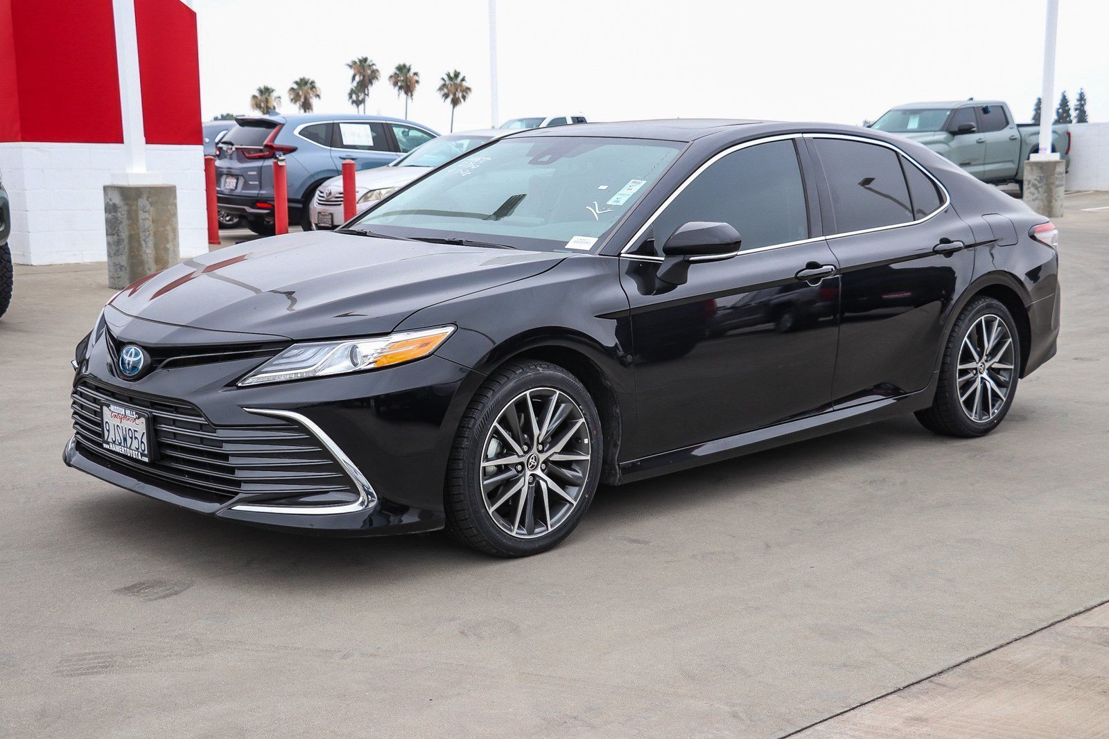 Used 2024 Midnight Black Metallic Toyota Hybrid XLE image 3