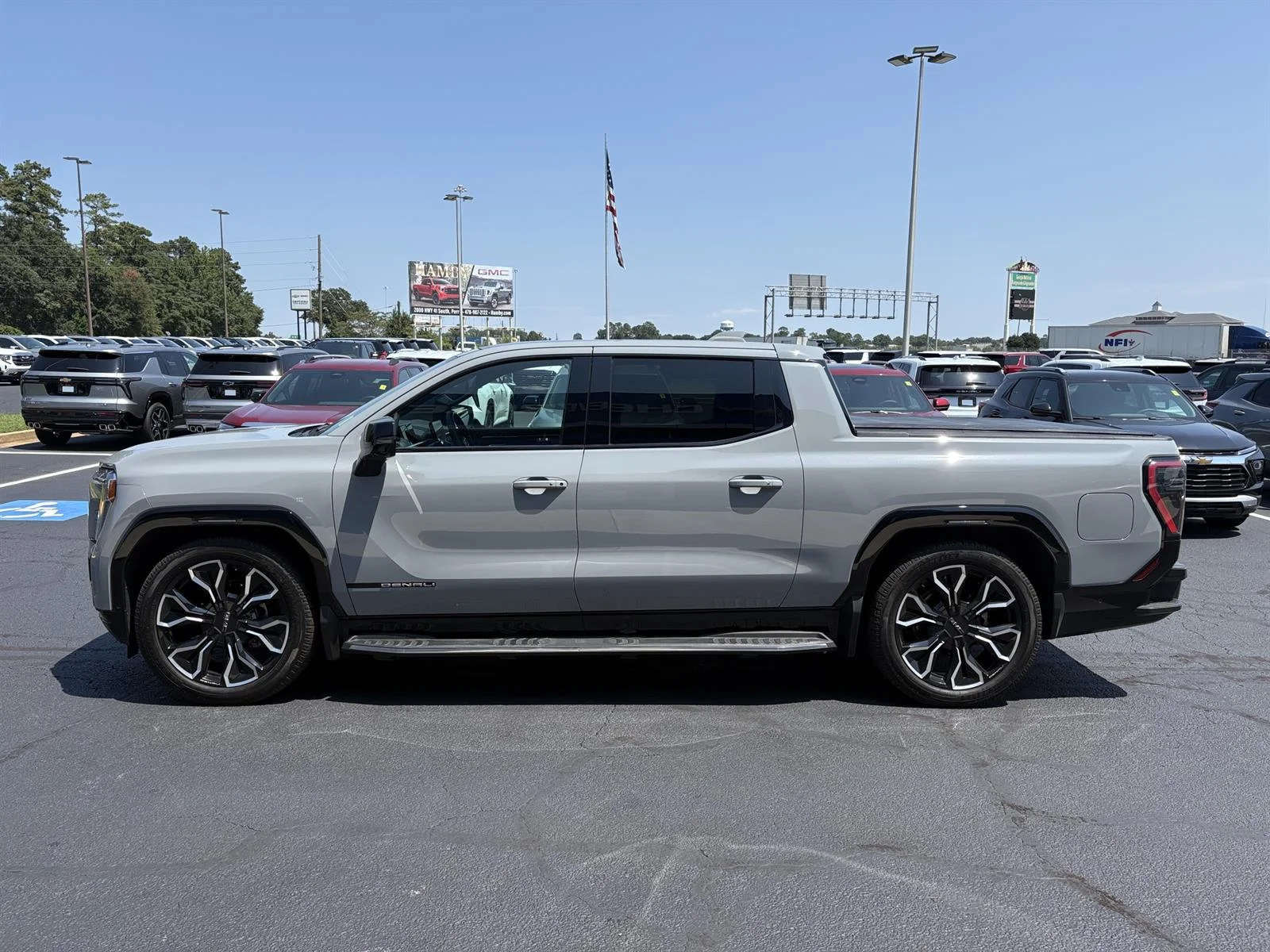 Used 2025 Thunderstorm Gray GMC Max Range Denali image 11