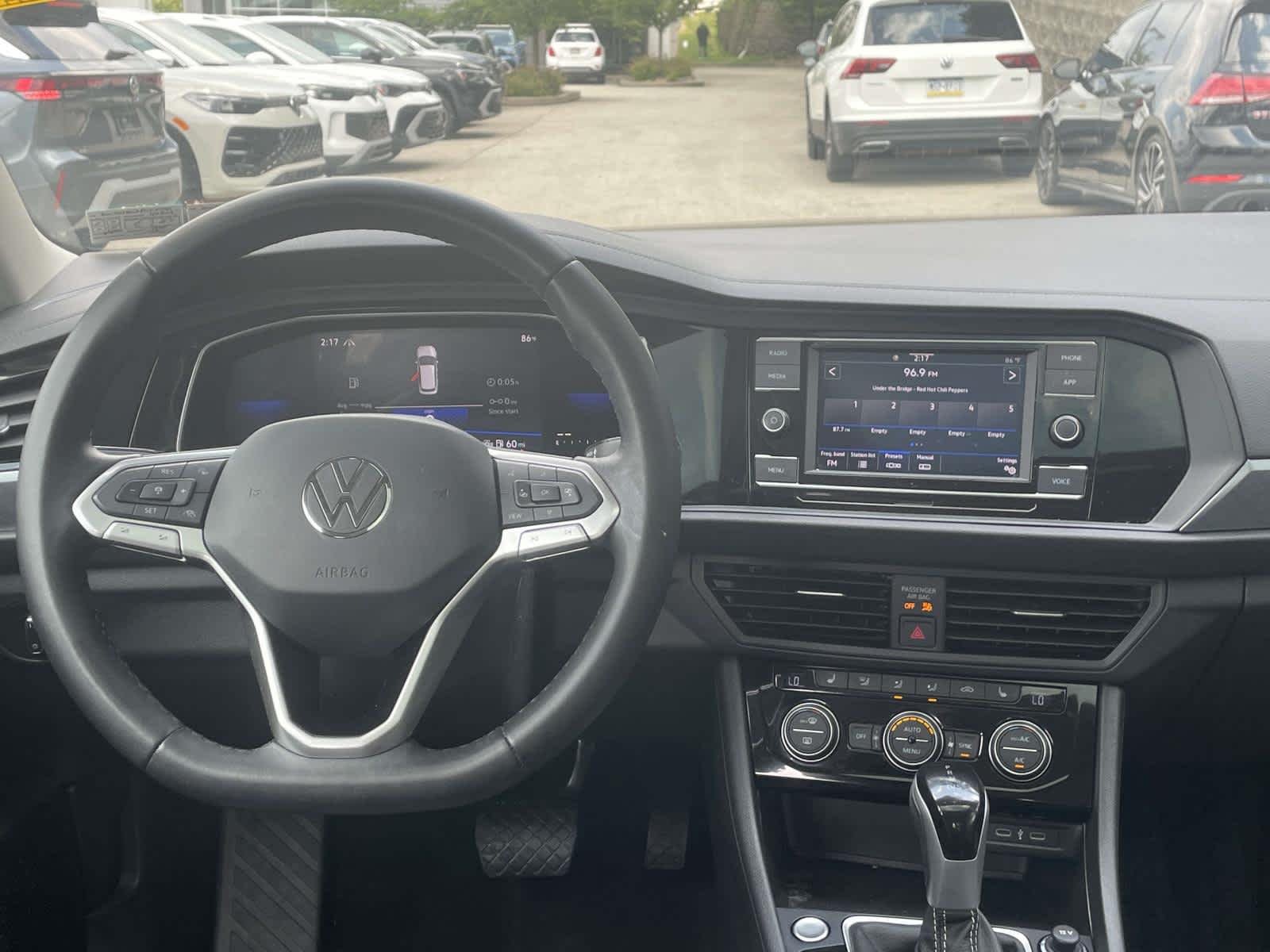 Certified Used 2023 Opal White Pearl Volkswagen SE image 2