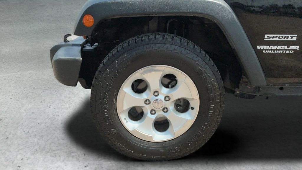 Used 2013 Black Jeep Unlimited Sport image 24
