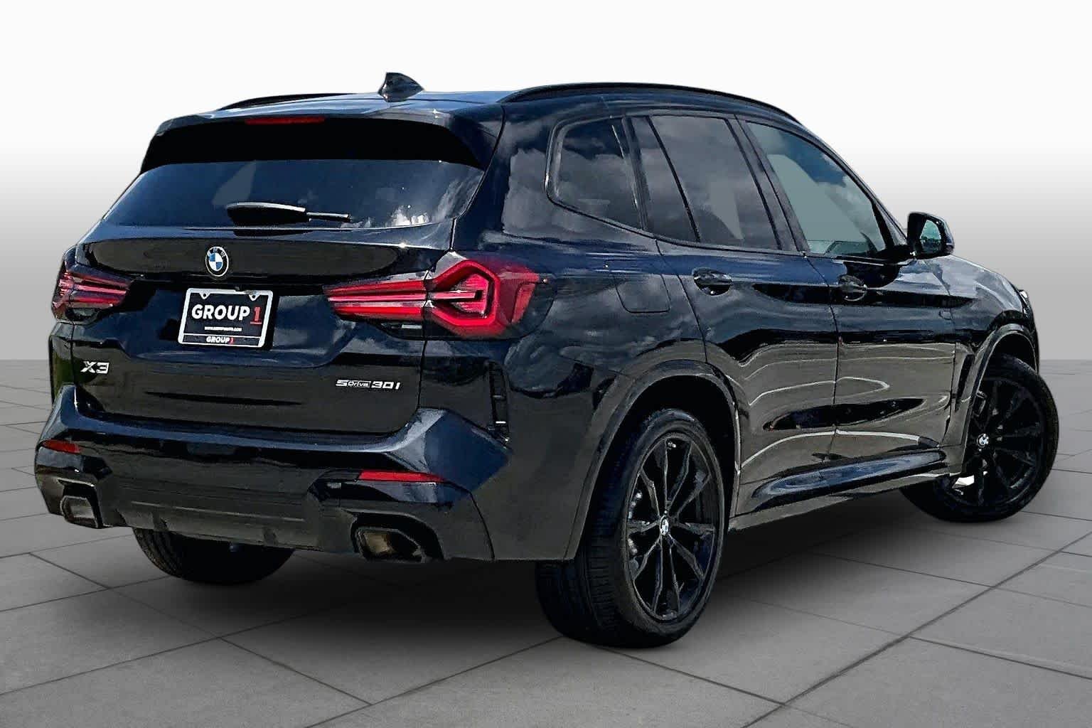 Used 2023 Black Sapphire Metallic BMW sDrive30i image 12