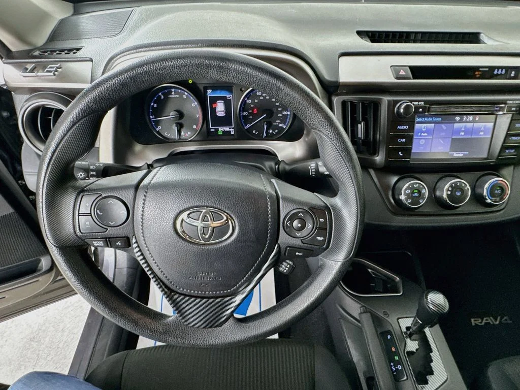 Used 2018 Magnetic Gray Metallic Toyota LE image 12