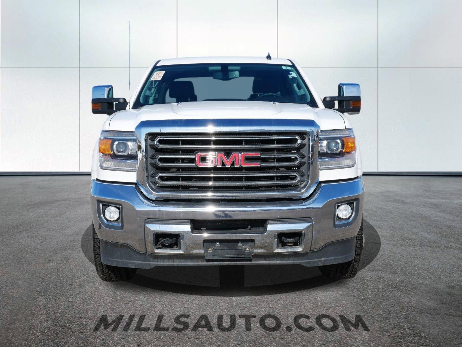 Used 2015 GMC Sierra 2500HD SLT with VIN 1GT12ZE87FF120188 for sale in Baxter, Minnesota