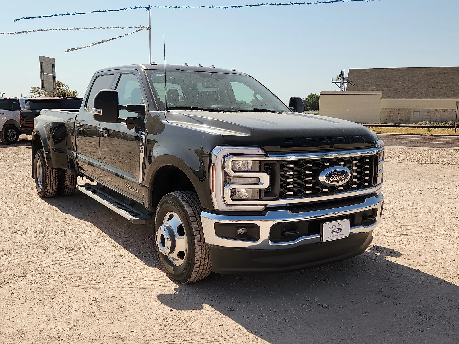 New 2026 Agate Black Metallic Ford Lariat image 1