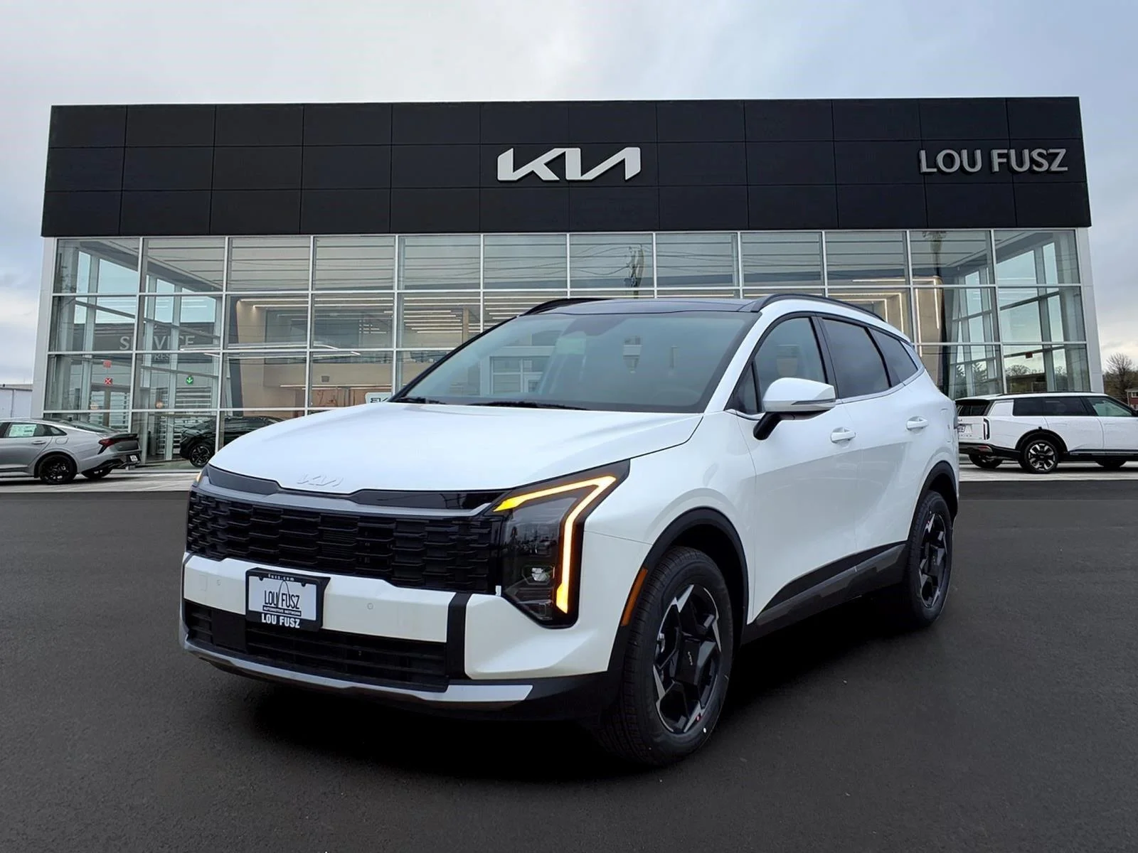New 2027 Snow White Pearl Kia EX image 1