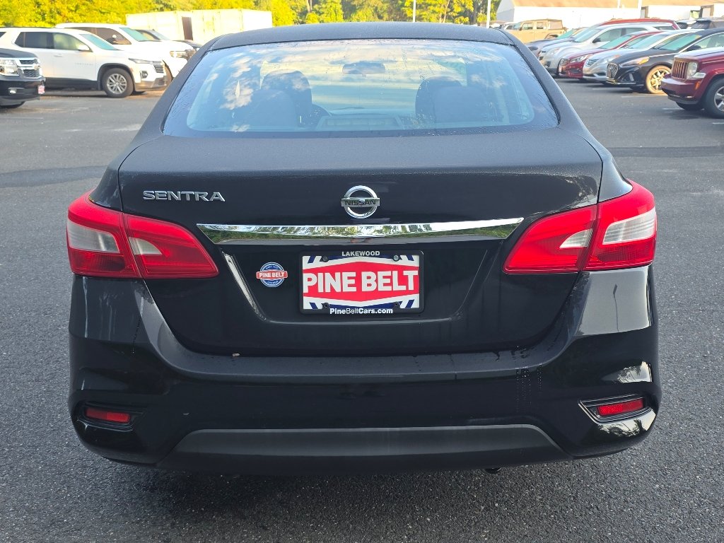 Used 2016 Super Black Nissan S image 11