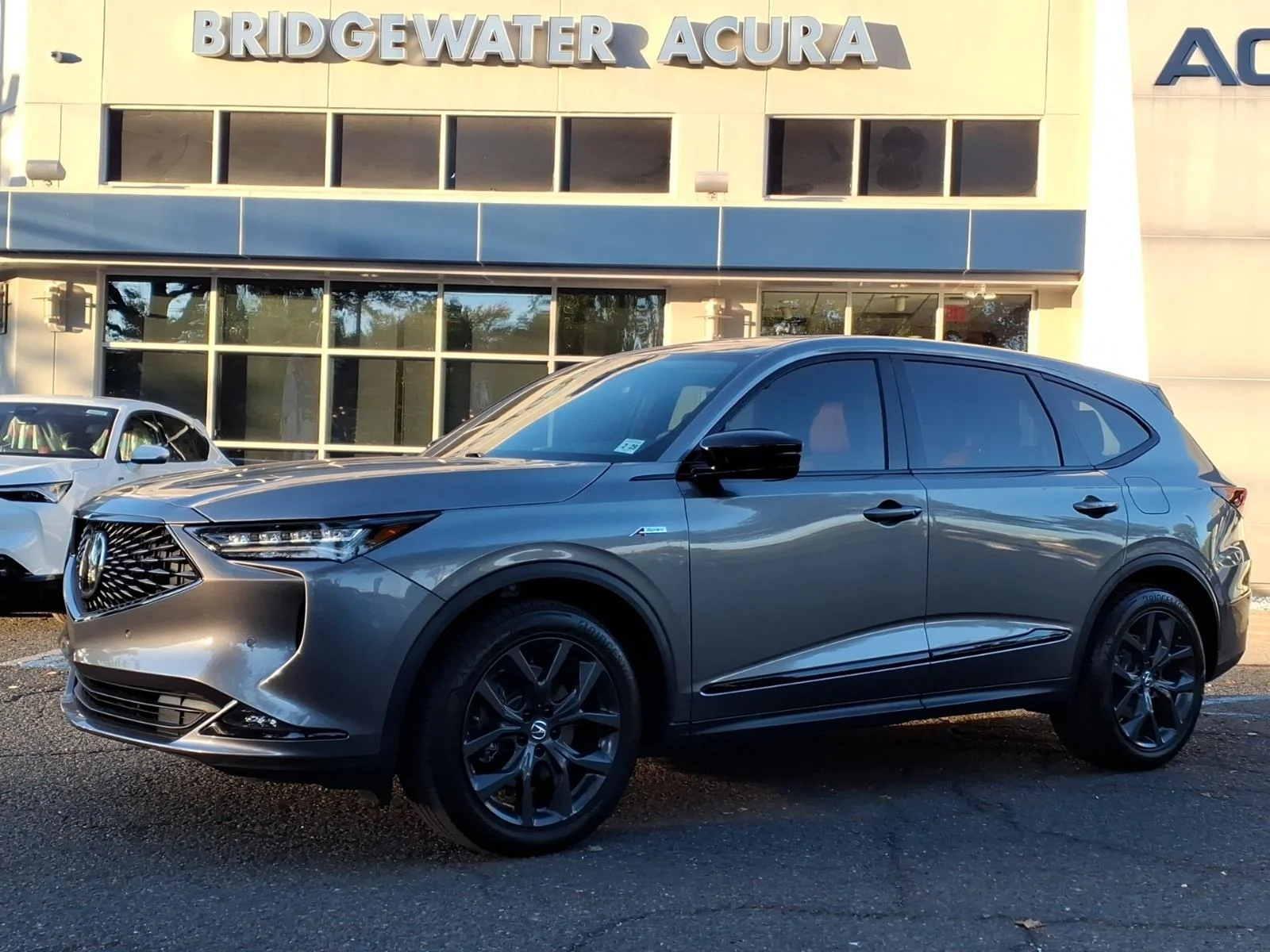 Used 2024 Liquid Carbon Metallic Acura SH-AWD A-SPEC image 1