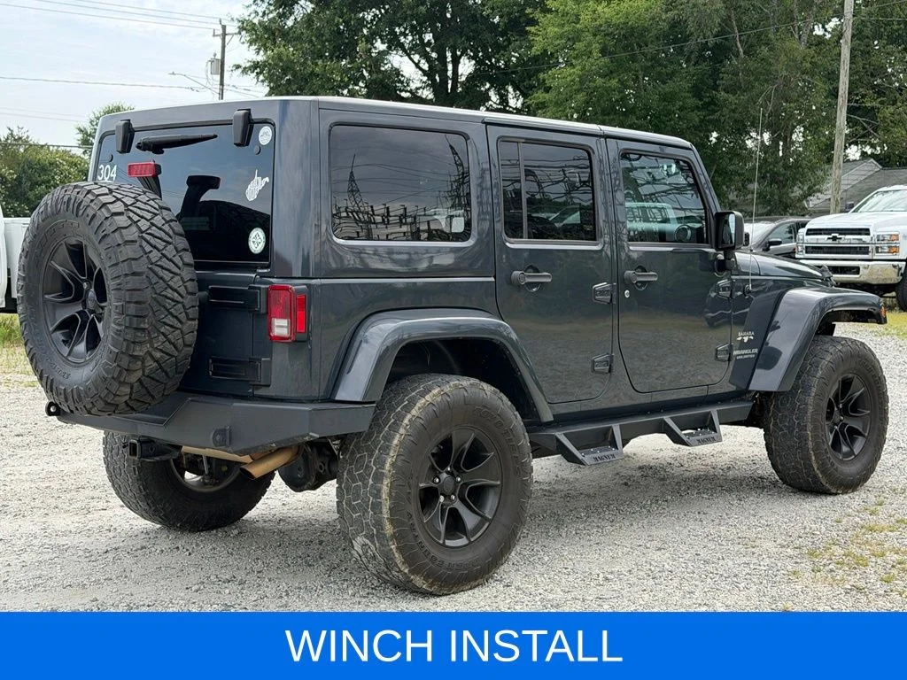 Used 2017 Black Jeep Unlimited Sahara image 5