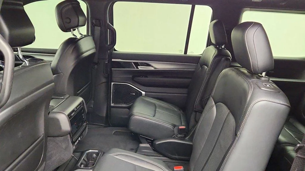 Used 2023 Diamond Black Crystal Pearlcoat Jeep Series II Carbide 4x4 w/ Tri-Pane Roof & Captain