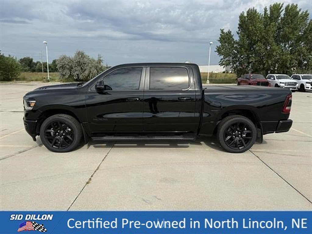 Used 2023 Diamond Black Crystal Pearl Coat Ram Laramie image 2