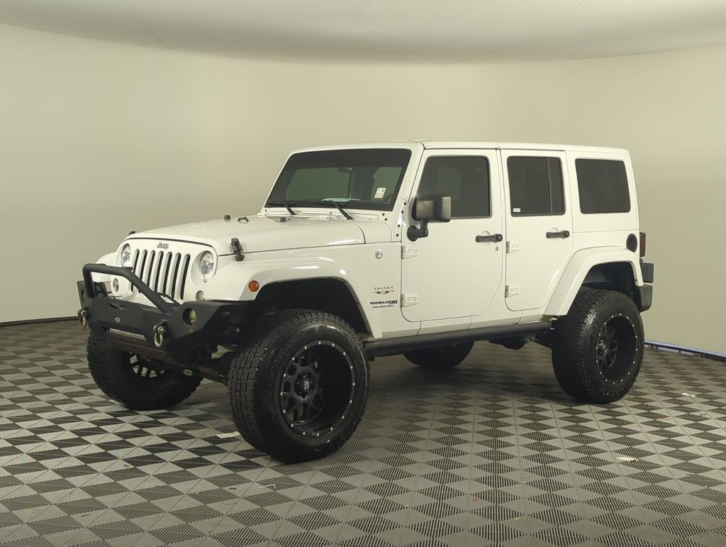 Used 2018 White Jeep Unlimited Sahara image 2