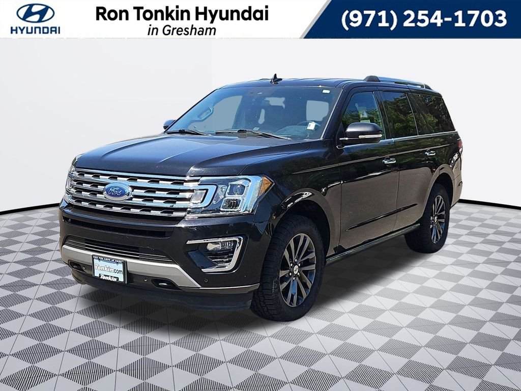 Used 2021 Agate Black Metallic Ford Limited image 1