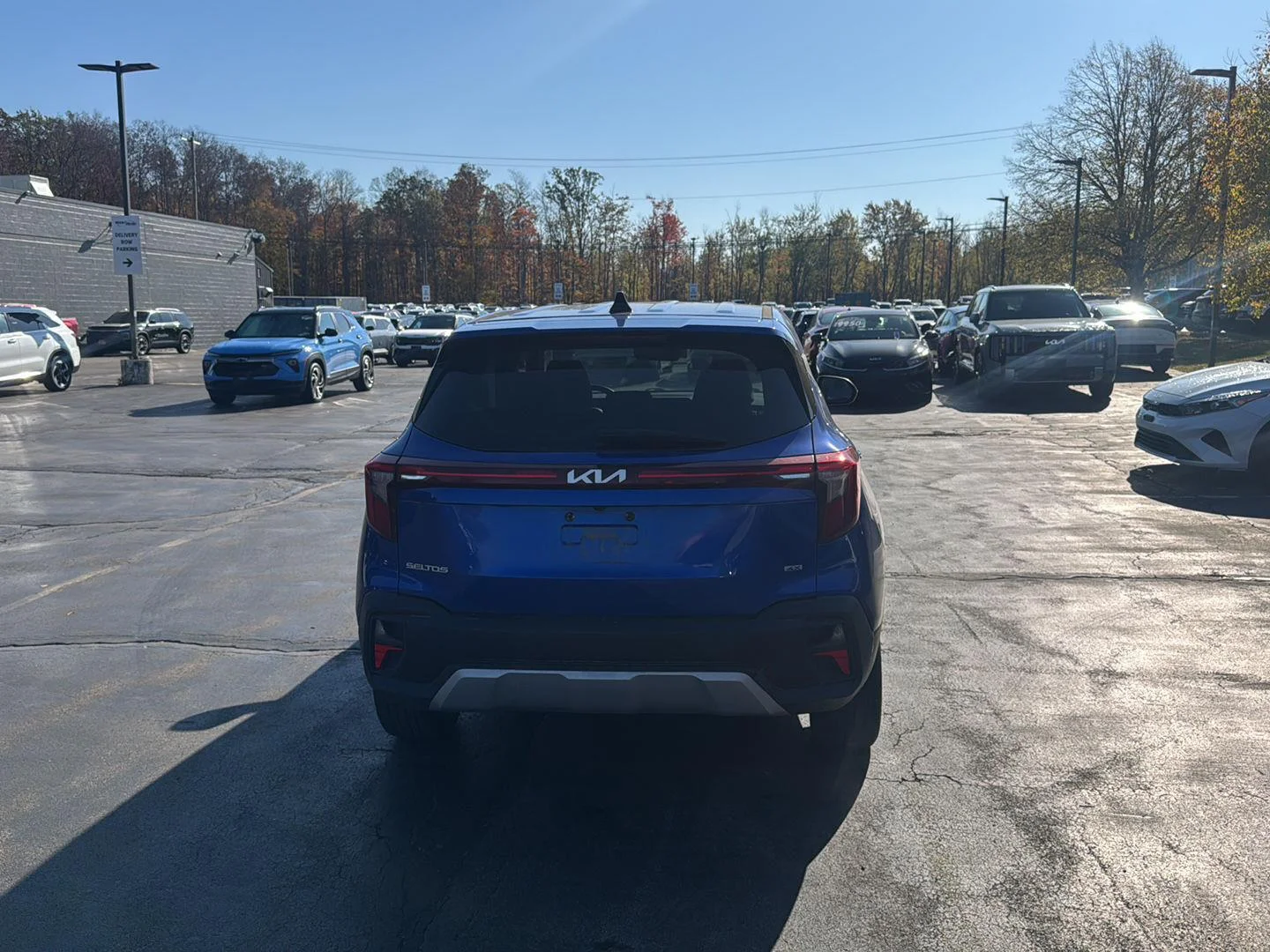 Used 2024 Neptune Blue Kia LX image 8