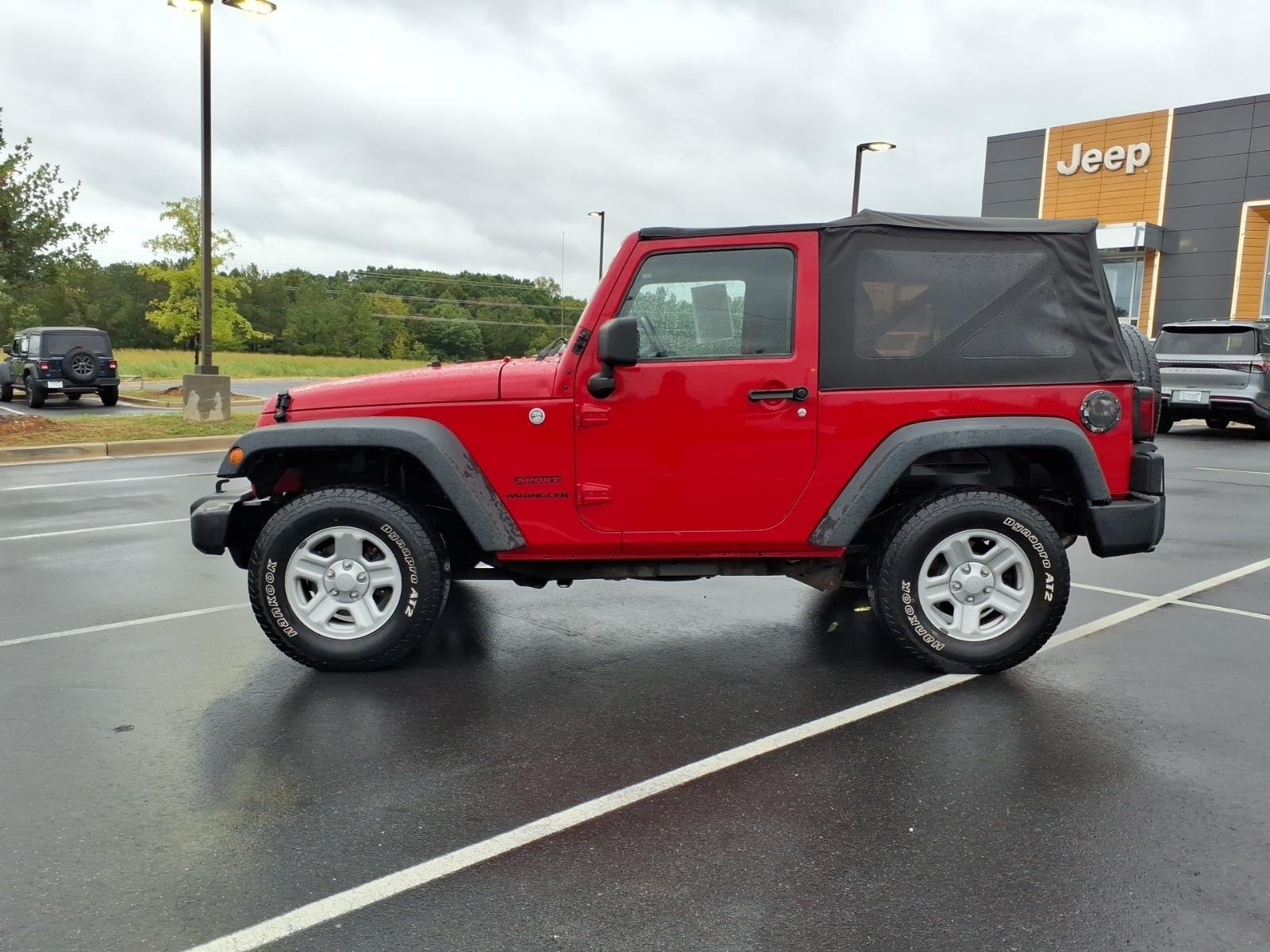 Used 2013 Flame Red Clearcoat Jeep Sport image 3