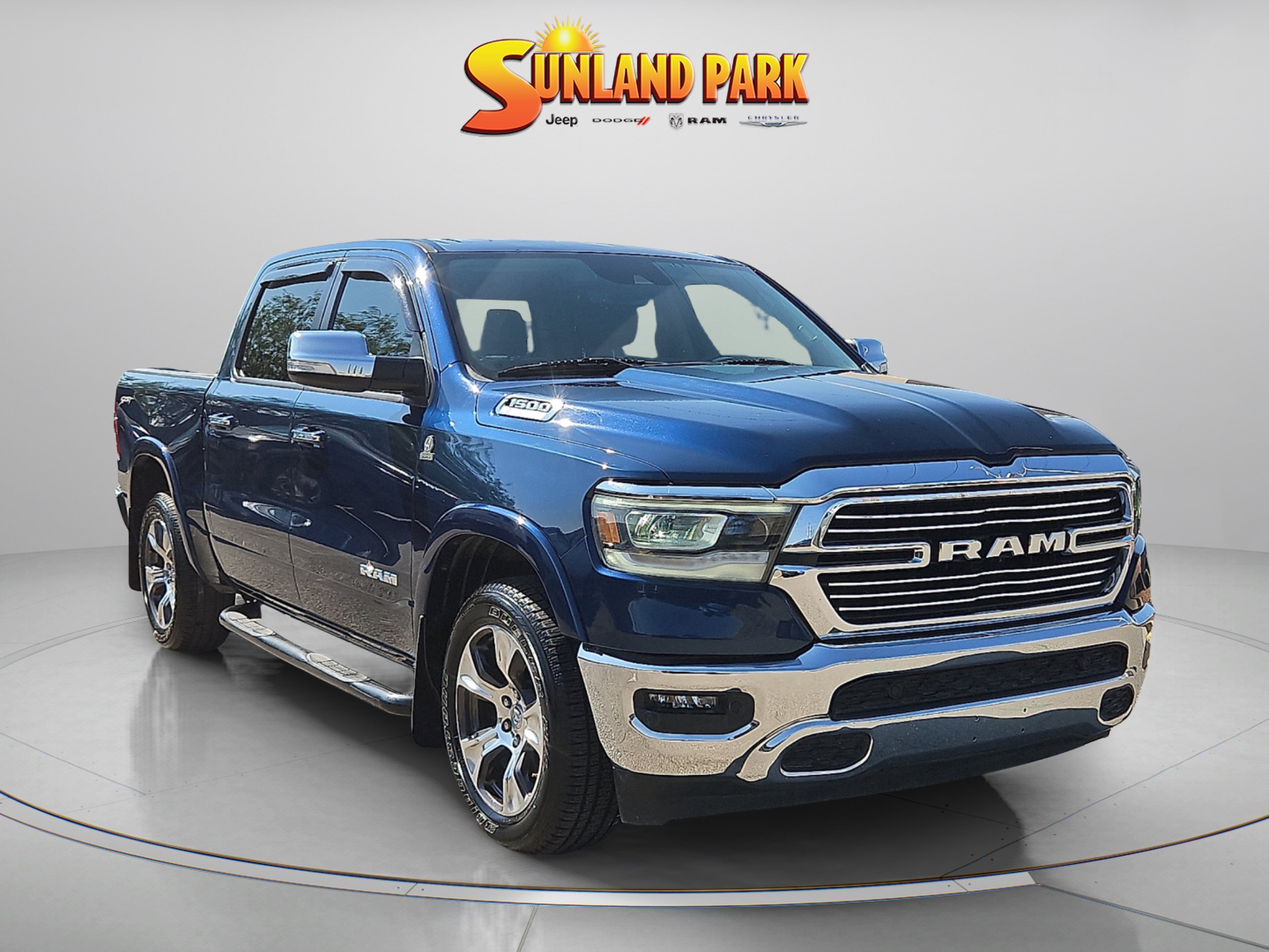 Used 2022 Patriot Blue Pearlcoat Ram Laramie image 1