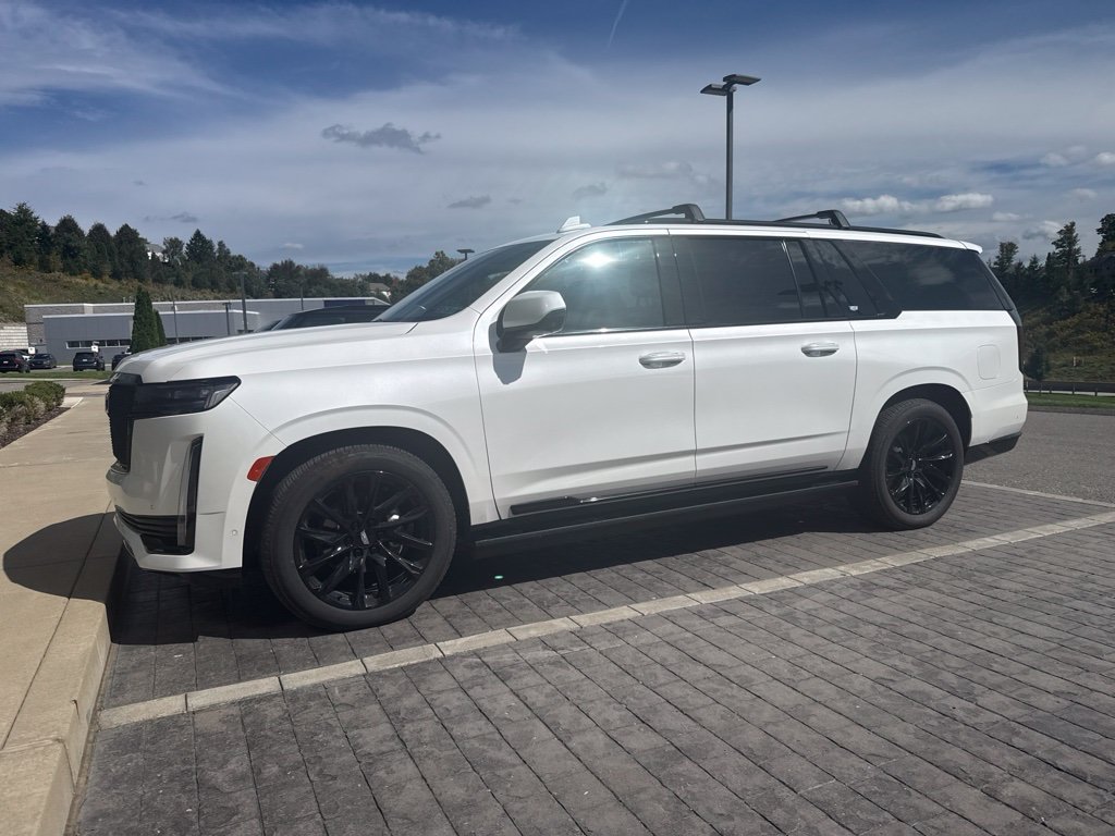 Used 2023 Crystal White Cadillac Sport Platinum image 1