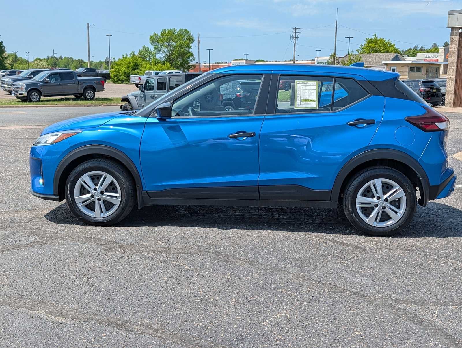Used 2024 Electric Blue Metallic Nissan S image 4