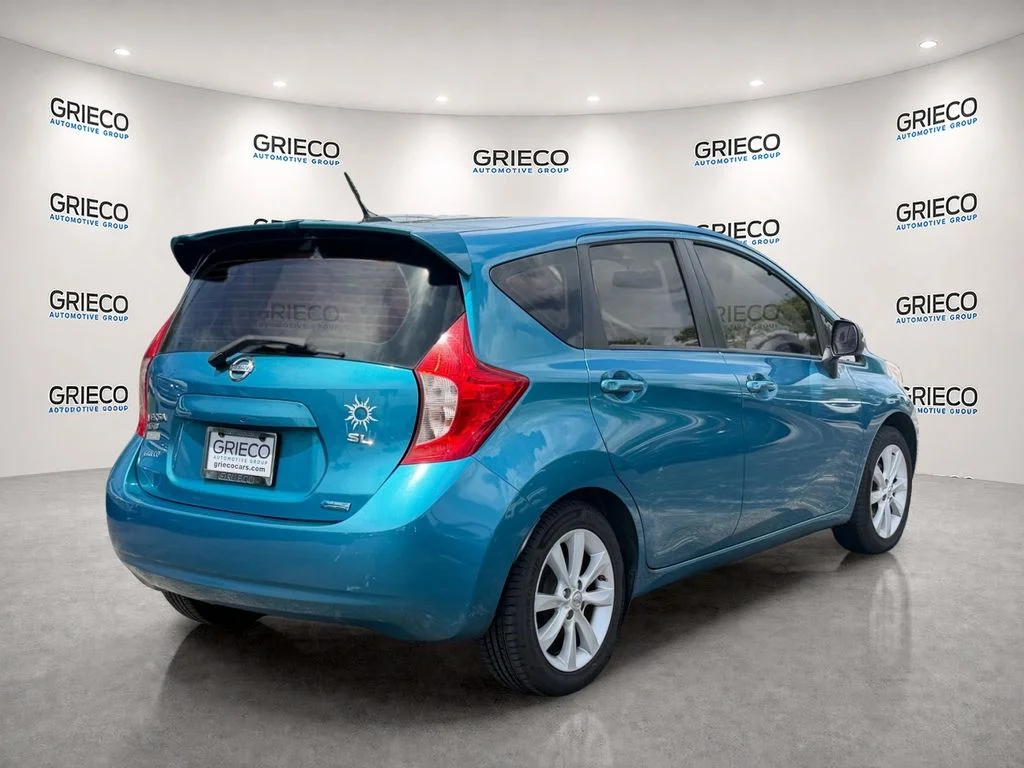Used 2014 Metallic Peacock Nissan SV image 7