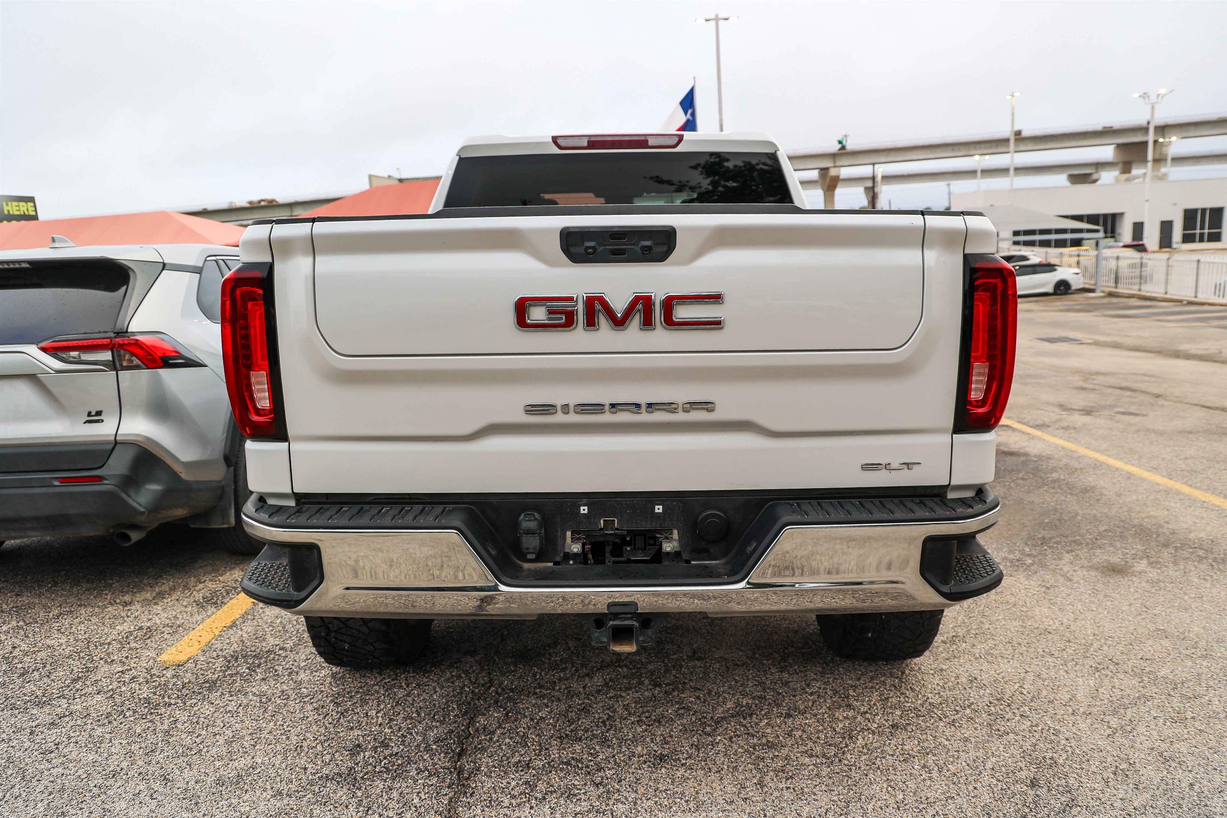 Used 2024 White Frost Tricoat GMC SLT image 7