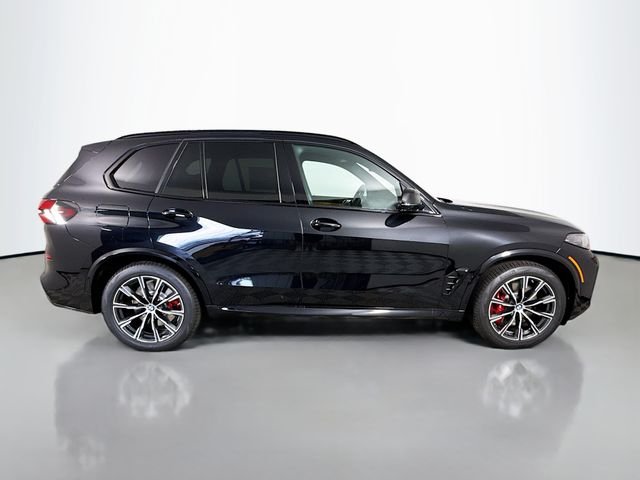 New 2026 Black Sapphire Metallic BMW xDrive50e image 8