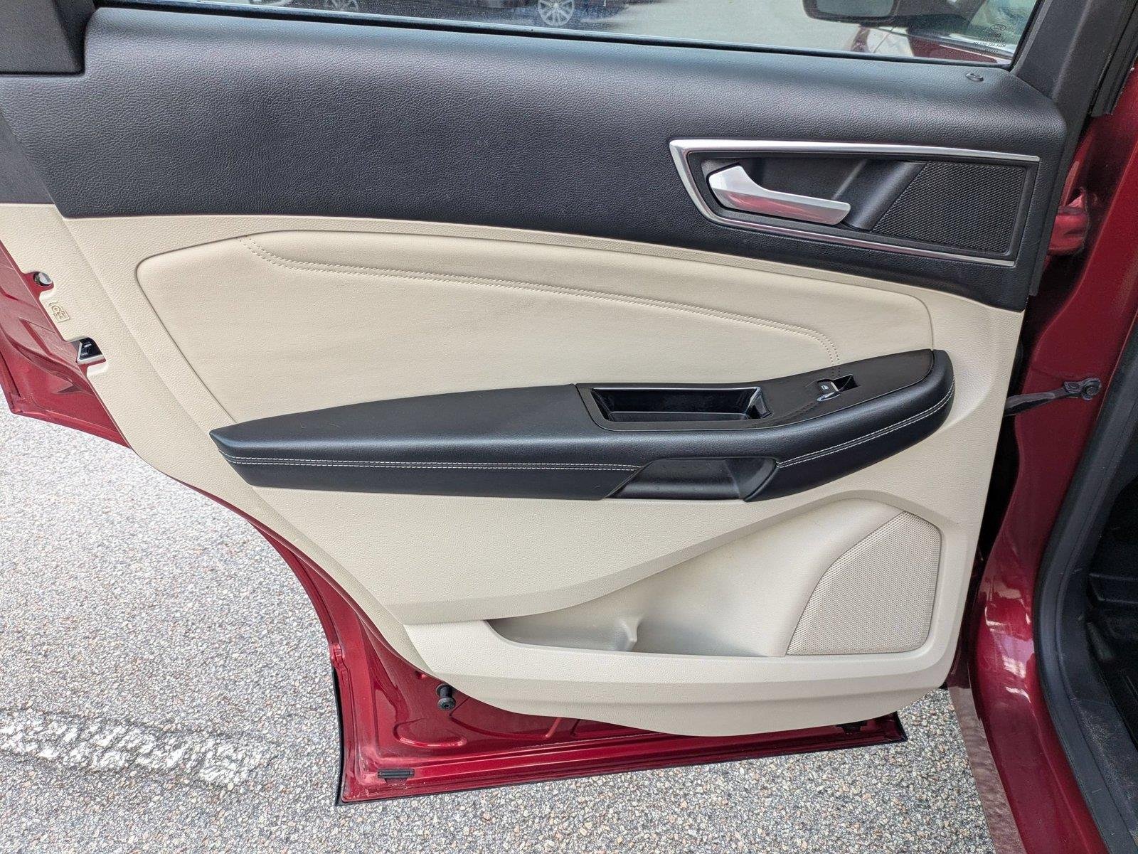 Used 2016 Ruby Red Metallic Tinted Clearcoat Ford Titanium image 26