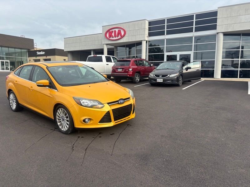 Used 2012 Yellow Ford Titanium image 4