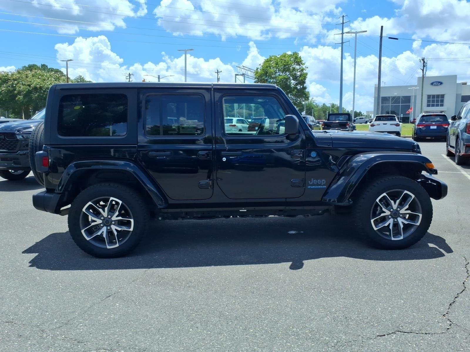 Used 2024 Black Clearcoat Jeep Sport S image 11
