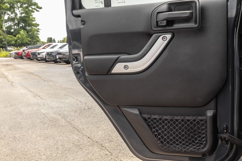 Used 2017 Black Jeep Unlimited Sahara image 28