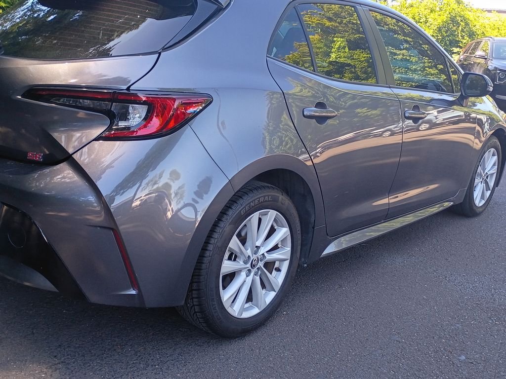 Used 2023 Magnetic Gray Metallic Toyota SE image 4