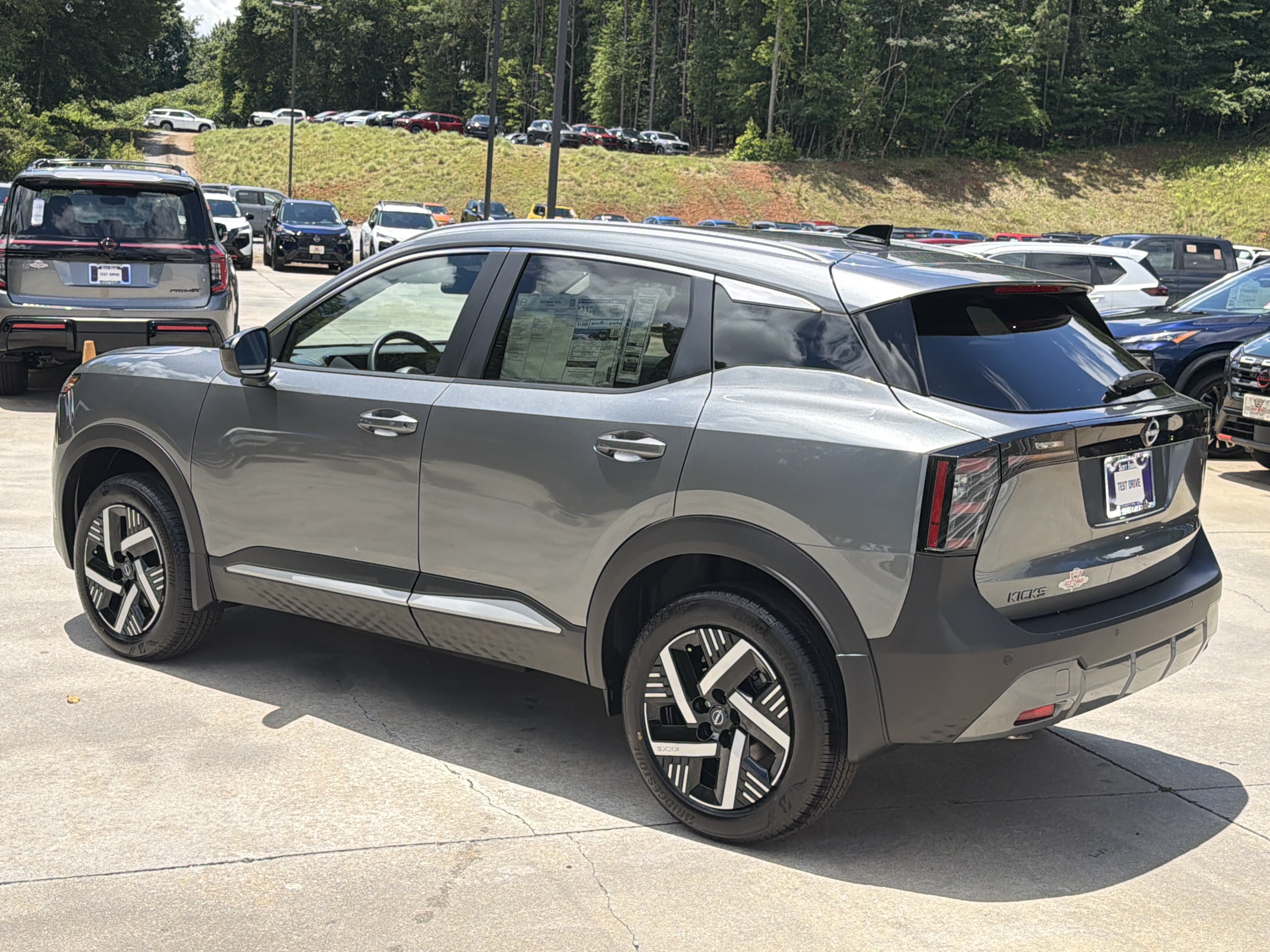 New 2026 Gun Metallic Nissan SV image 6