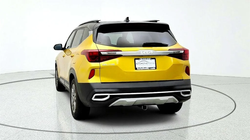 Used 2023 Starbright Yellow/Black Roof Kia S IVT AWD w/ Navigation Pkg & Illuminated Sills image 6