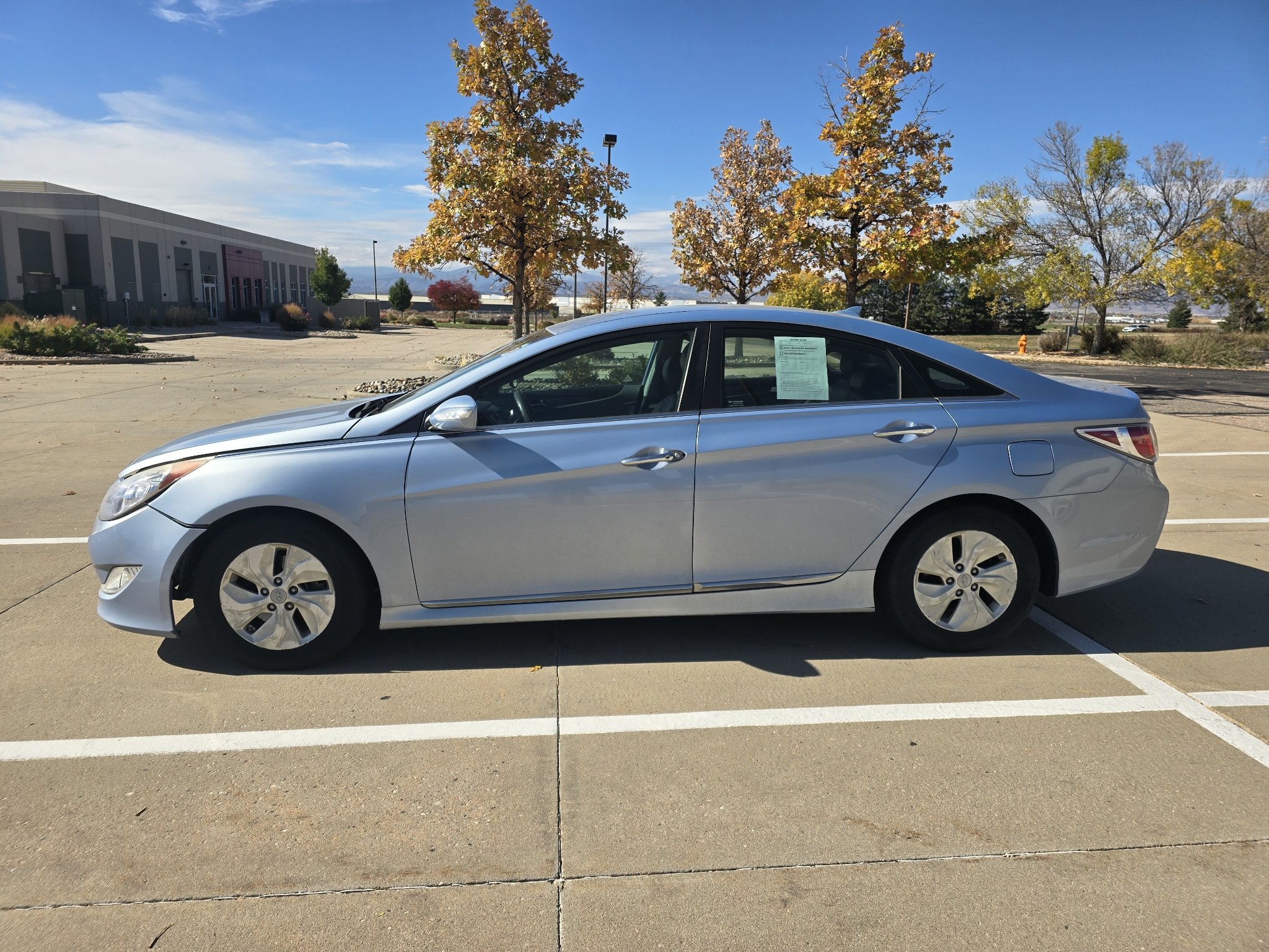 Used 2013 Hyundai Sonata Hybrid Base with VIN KMHEC4A42DA071718 for sale in Loveland, CO