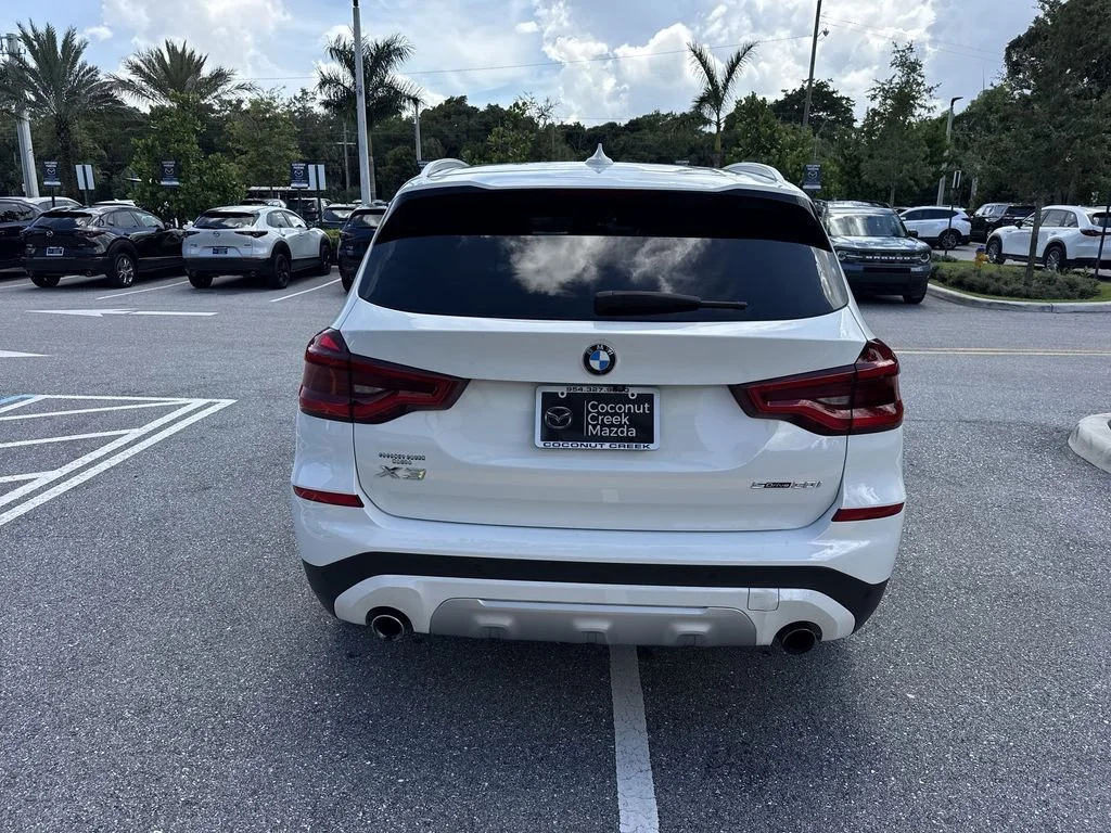 Used 2021 Alpine White BMW sDrive30i image 2