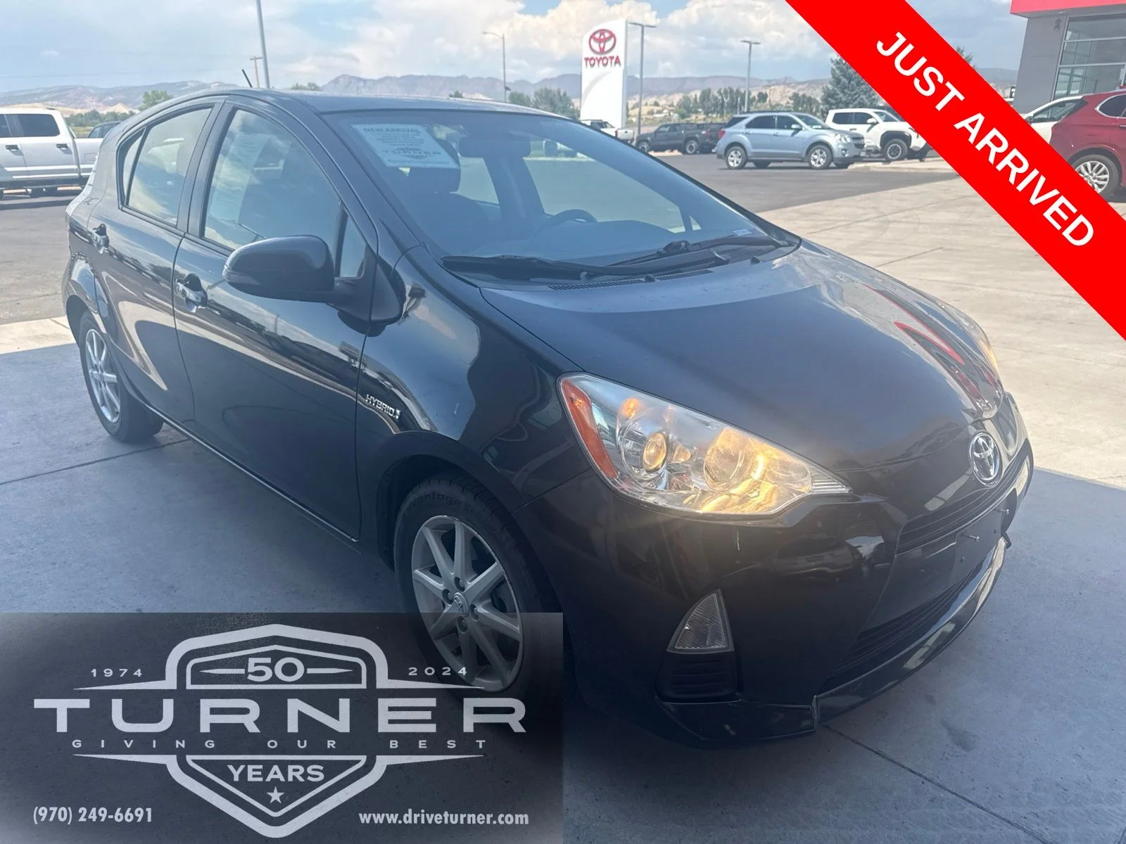 Used 2013 Black Toyota Three image 1