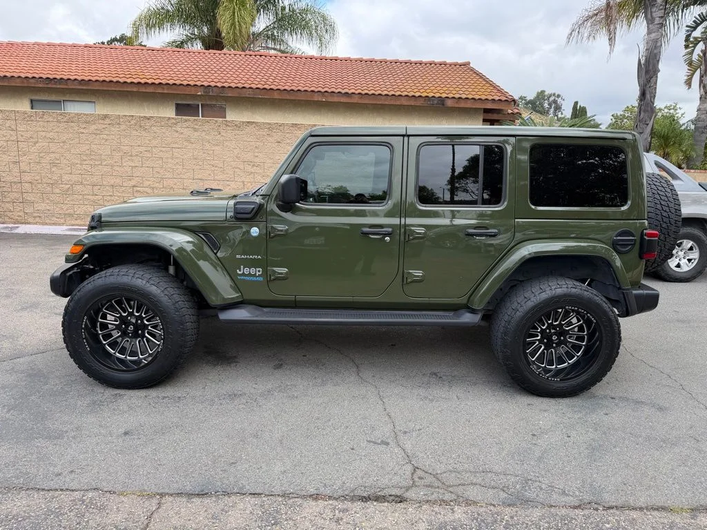 Used 2021 Green Jeep Unlimited Sahara 4xe image 6