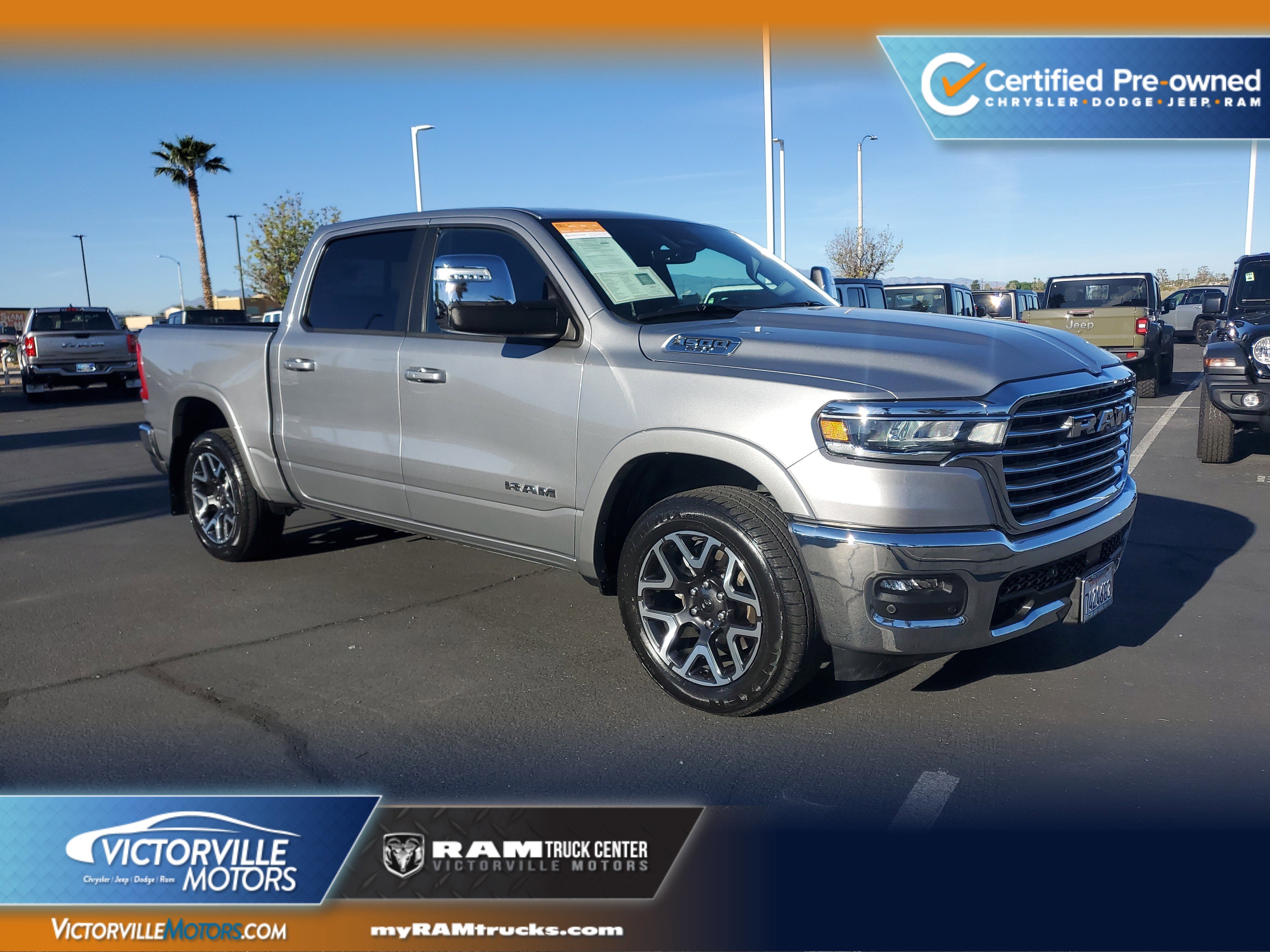 Silver 2025 RAM 1500 Laramie Crew Cab 4WD Pickup Truck Four-Wheel Drive 8-Speed Automatic