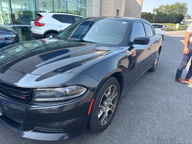 Used 2015 Black Dodge SXT image 1