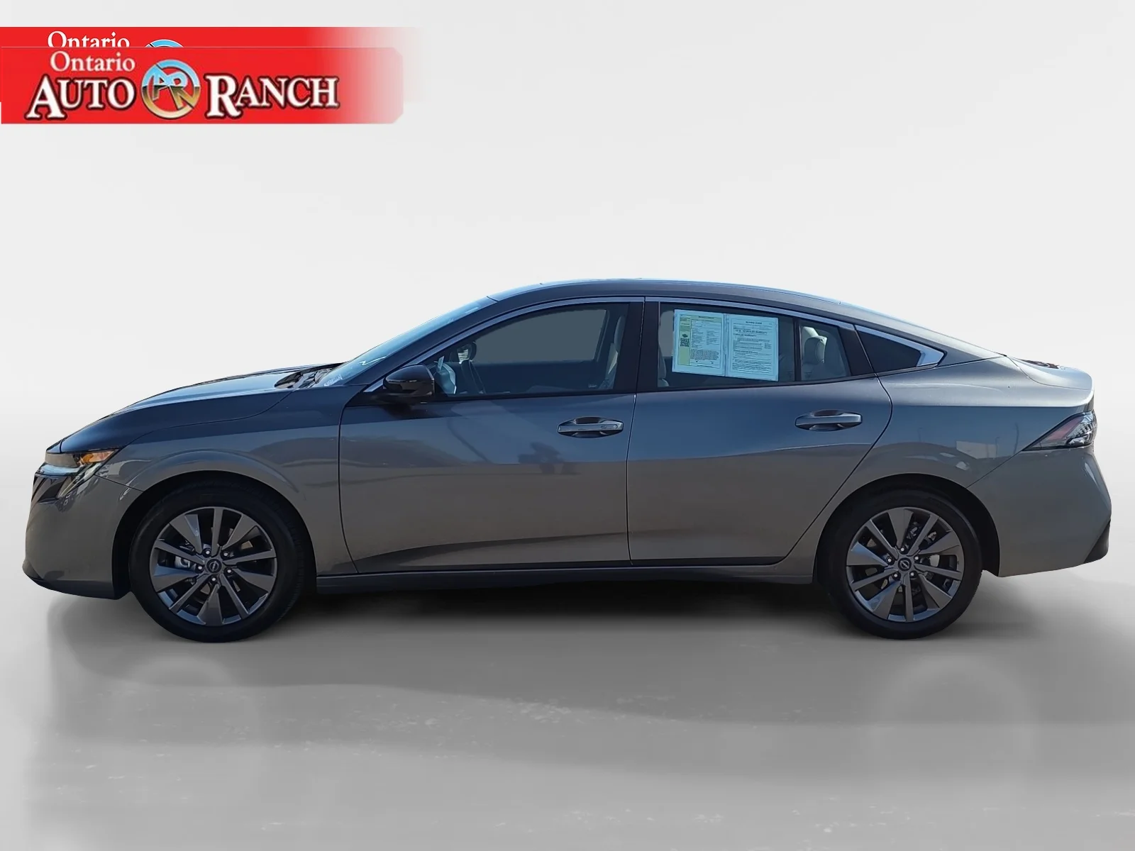 Used 2026 Gun Metallic Nissan SL image 2