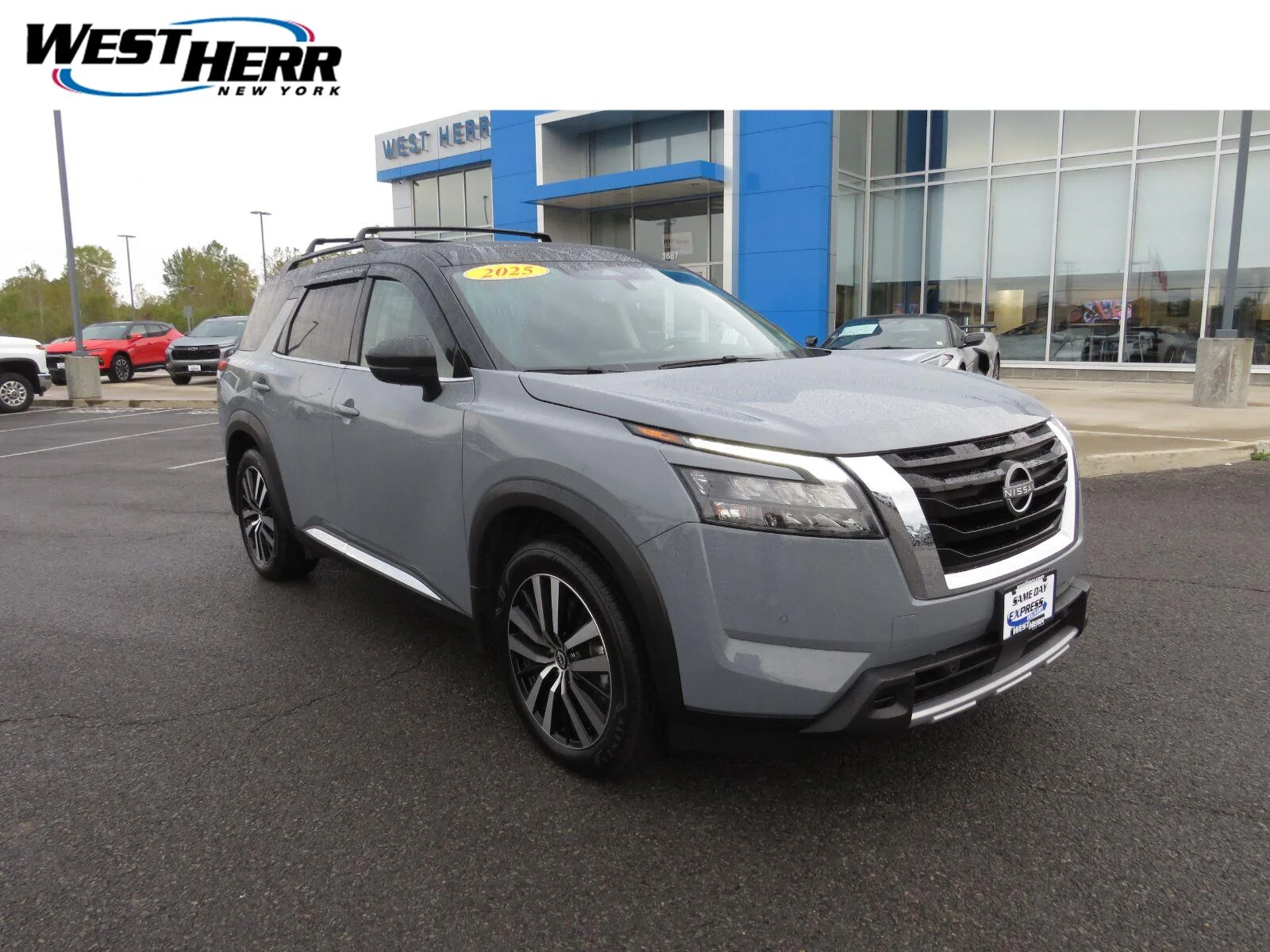 Used 2025 Solid Gray/Super Black Nissan Platinum image 1