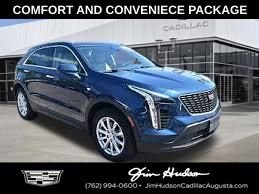 Used 2019 Blue Cadillac Sport image 1