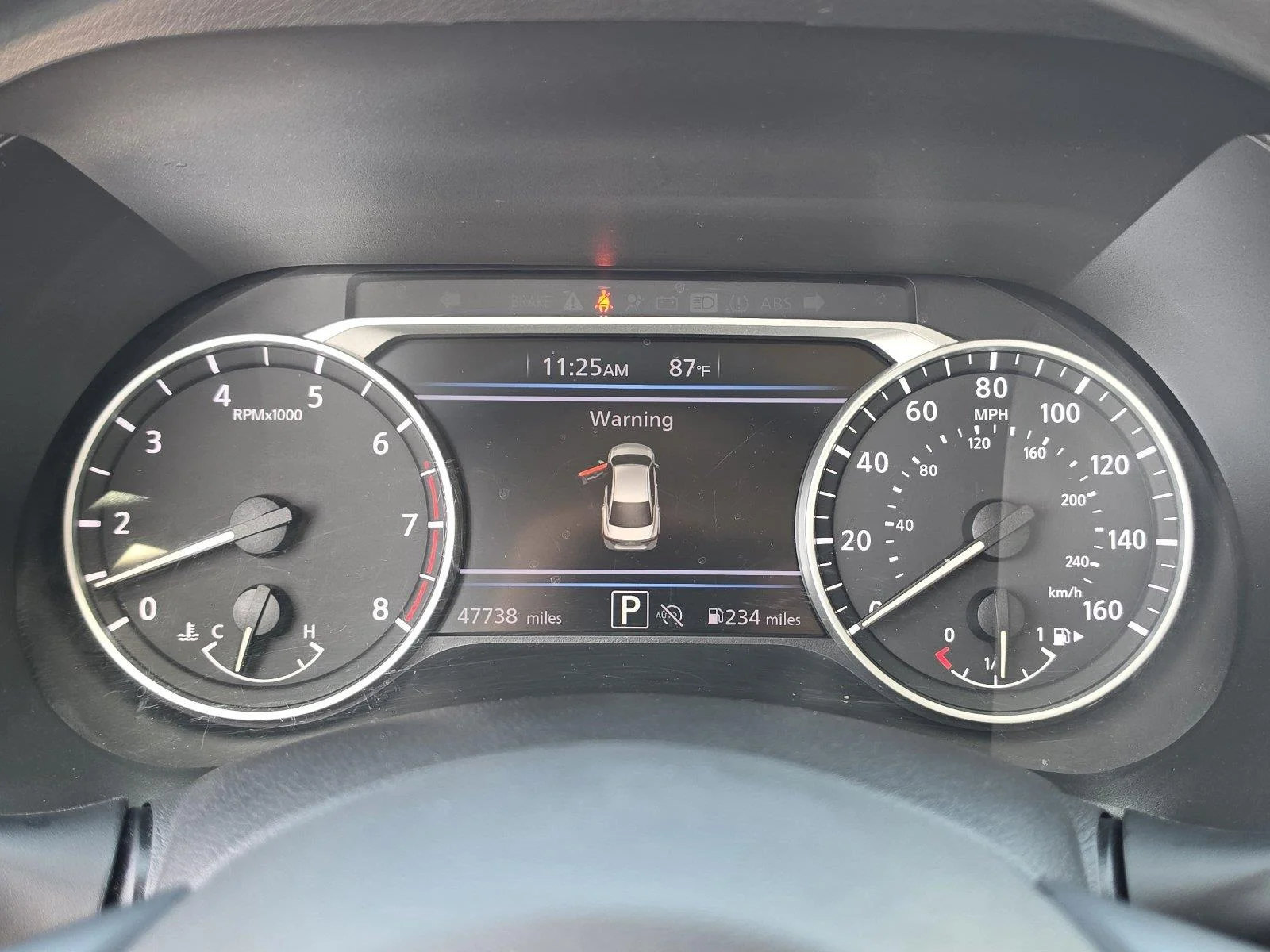 Used 2025 Electric Blue Metallic Nissan SV image 12