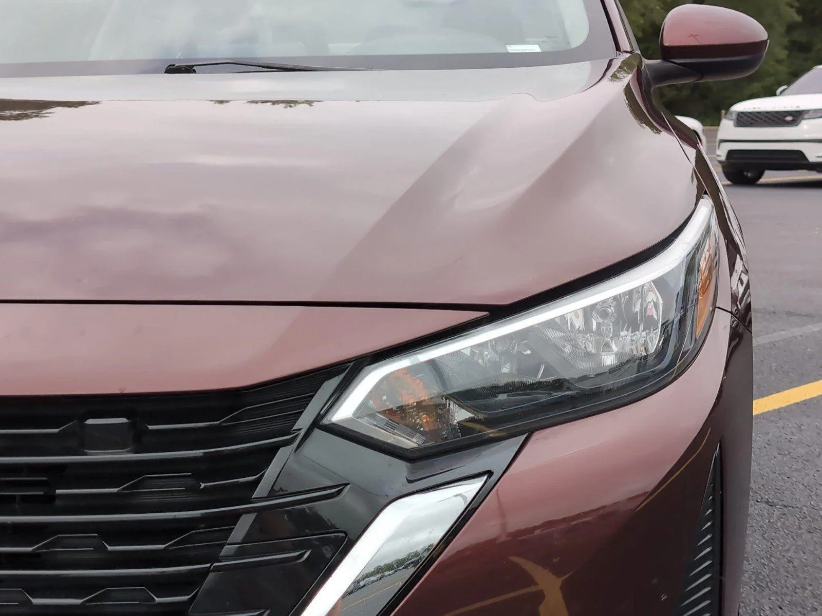 Used 2024 Rosewood Metallic Nissan SV image 12