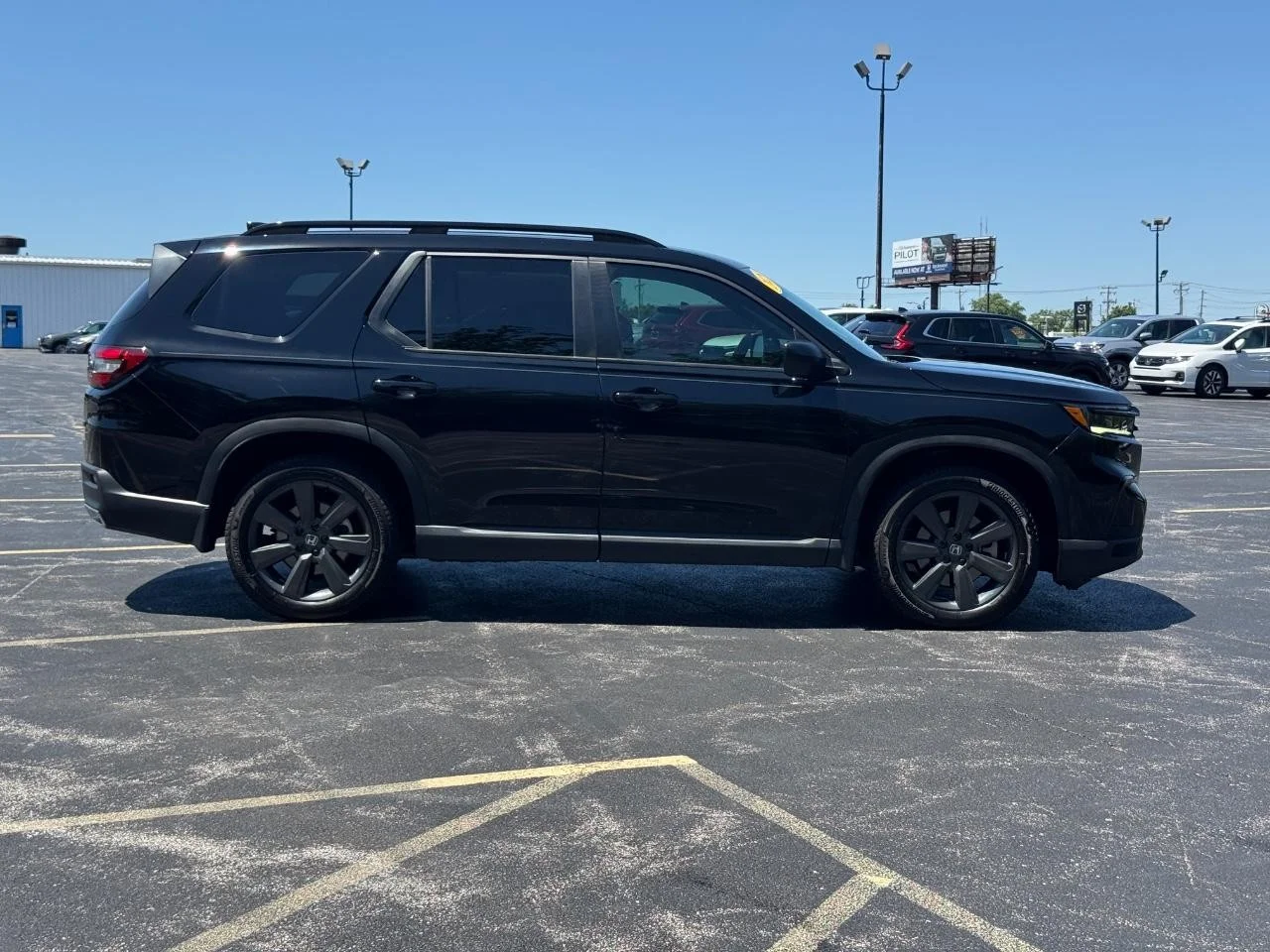 Used 2025 Crystal Black Pearl Honda Sport image 3