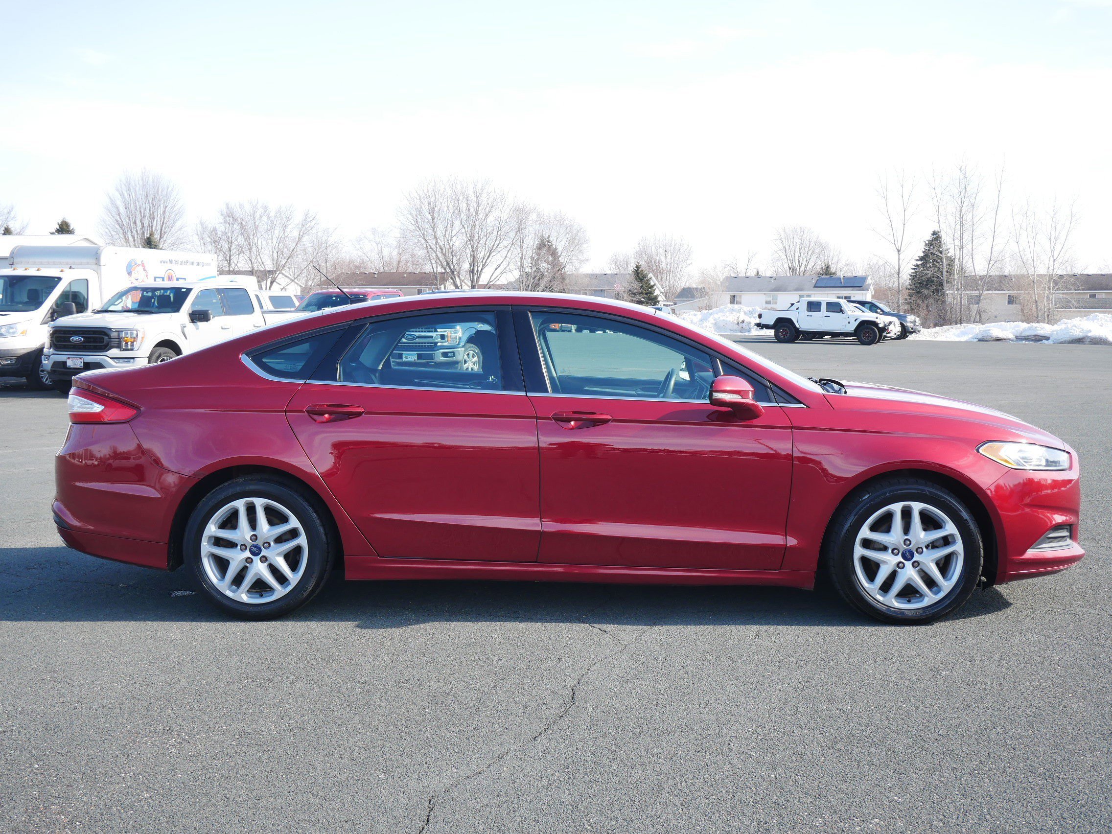 Used 2016 Ruby Red Metallic Tinted Clearcoat Ford SE image 6