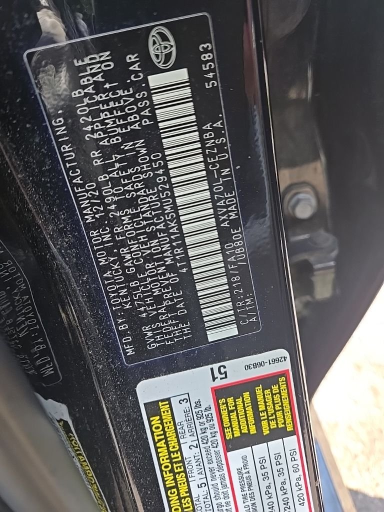 Used 2021 Midnight Black Metallic Toyota LE image 21