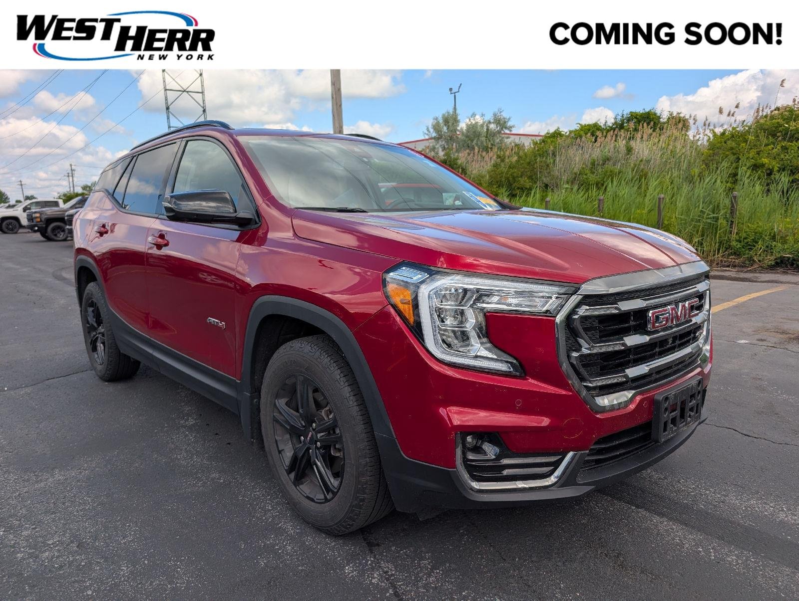 Used 2024 Volcanic Red Tintcoat GMC AT4 image 1