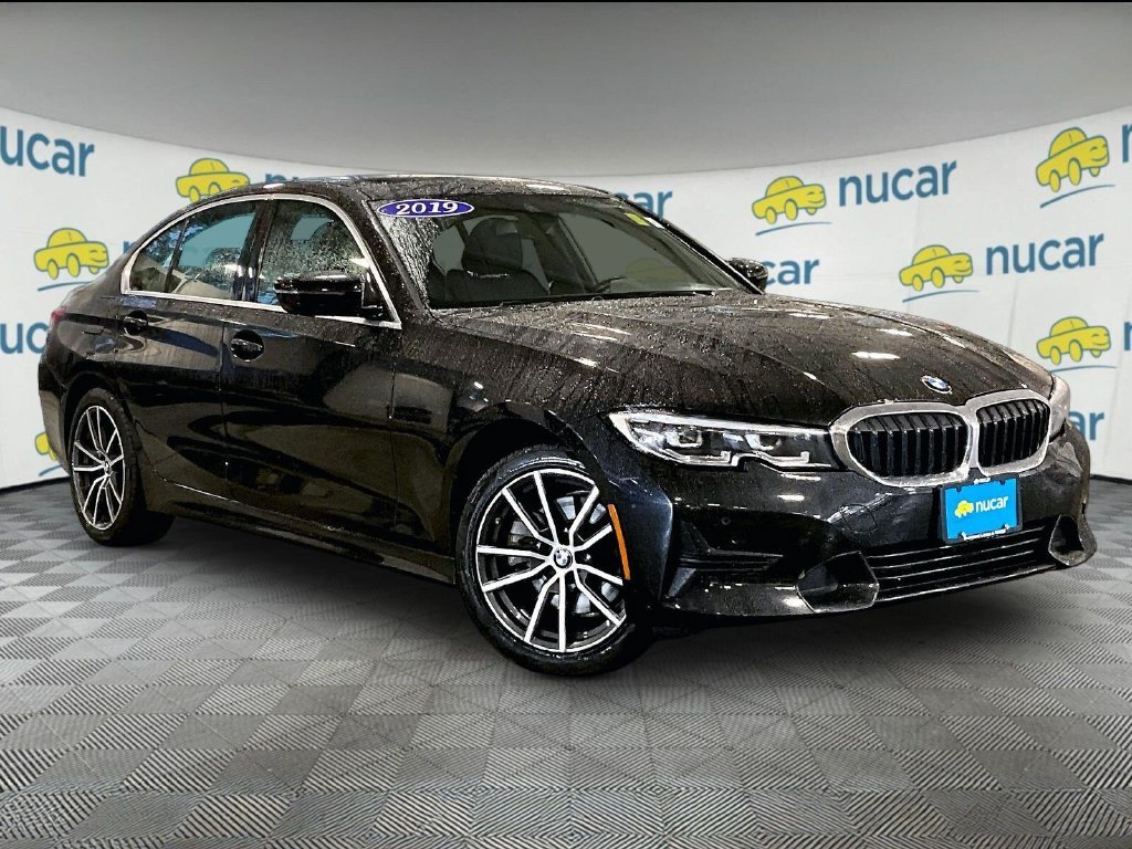 Used 2019 Black BMW 330i xDrive image 1