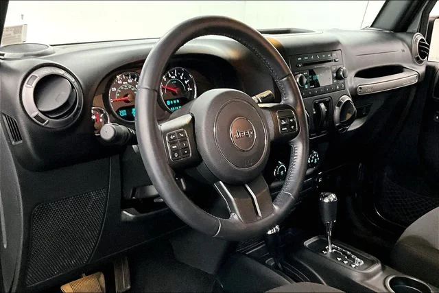 Used 2017 Granite Crystal Metallic Clearcoat Jeep Sport image 17