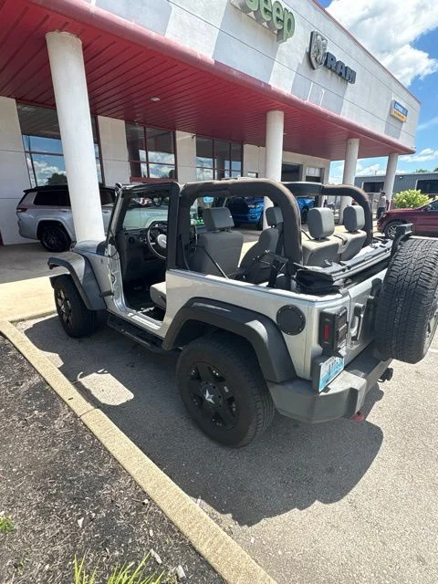 Used 2010 Silver Jeep Sport image 7