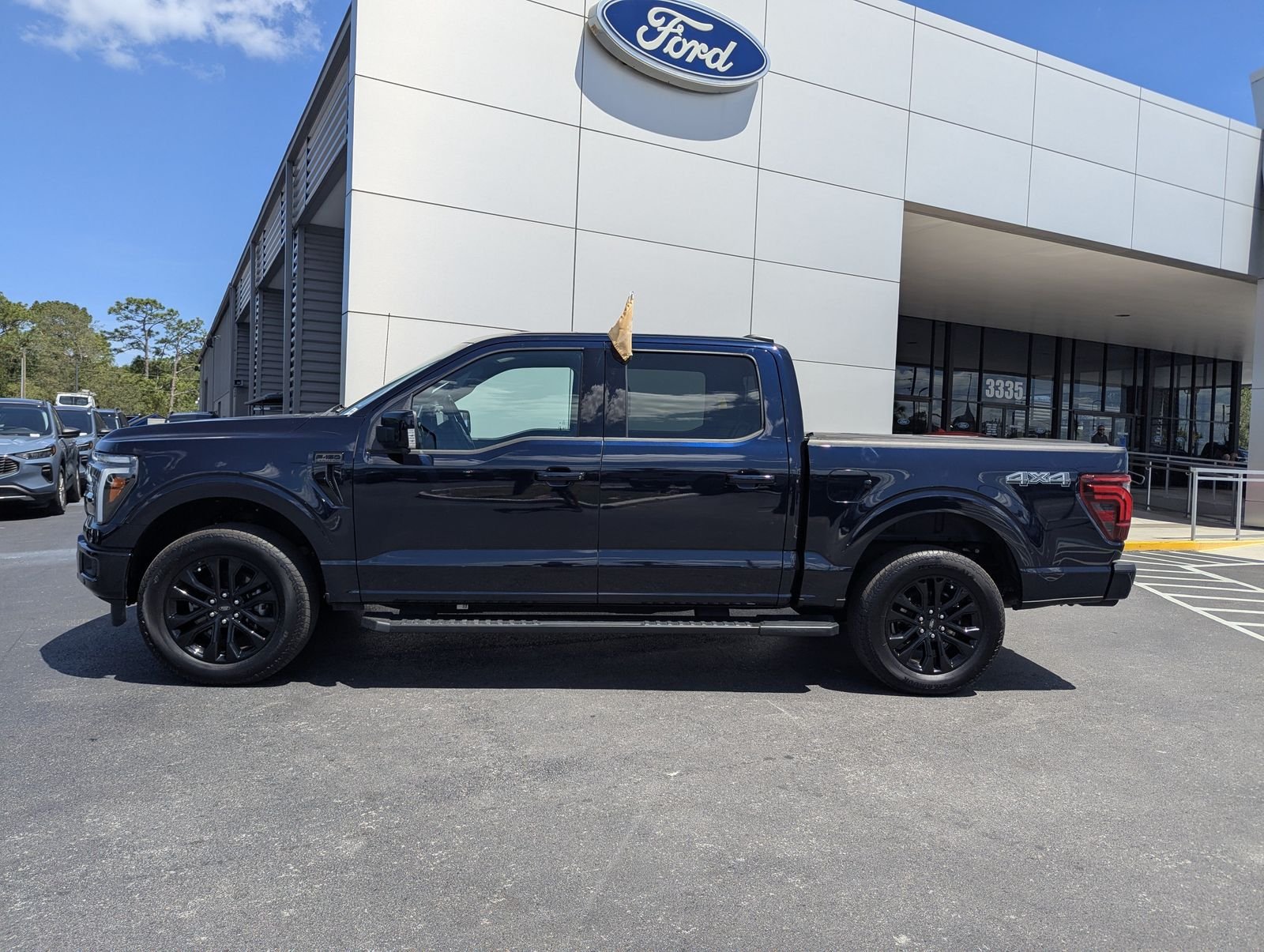 Certified Used 2025 Blue Metallic Ford Lariat image 8